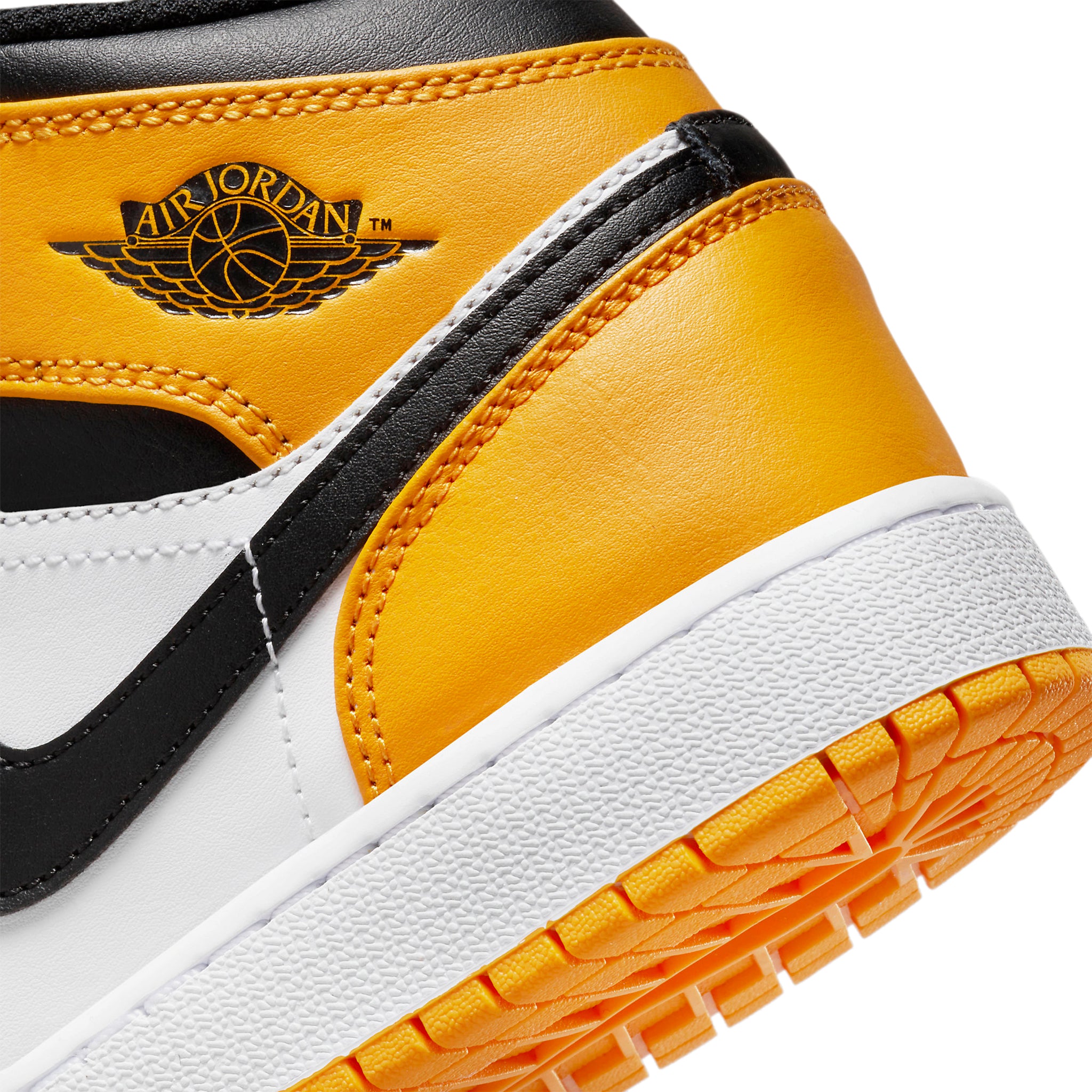 Wings logo view of Air Jordan 1 Mid Taxi (GS) 554725-701